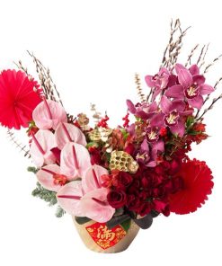 pink anthurium roses cymbidium chinese new year flower arrangement