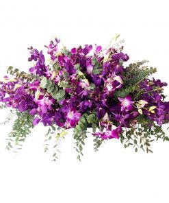 purple orchid casket spray
