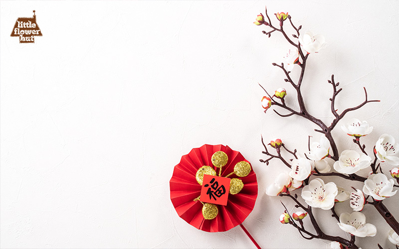 Artificial plum blossom with a white background