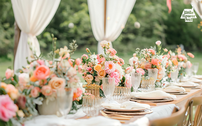 Floral bouquet setup at an event dining table