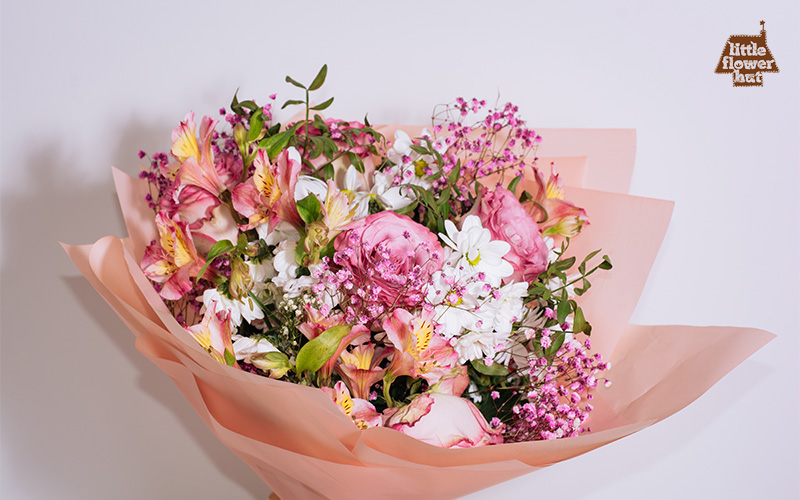 A bouquet of pink and white flowers for a birthday
