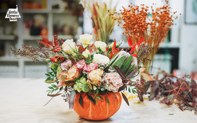 Floral arrangement in a pumpkin vase