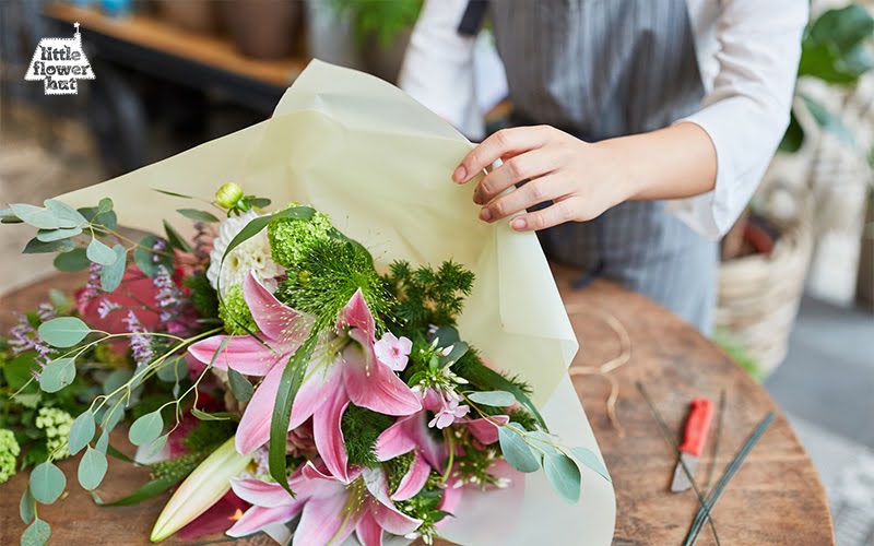 Woman arranging flowers